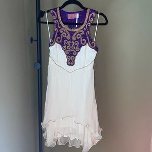 Free People, size 6 gauze dress with dark purple and dark gold embroidery.